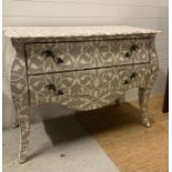 A two drawer bombe commode on down swept legs painted in grey with white tulip detail l120X56 height