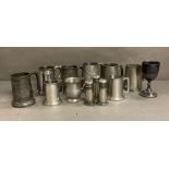 A selection of metalware to include tankards etc.