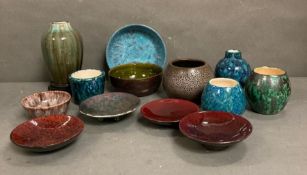 A selection of glazed Swiss Studio pottery in blues, greens and reds