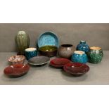 A selection of glazed Swiss Studio pottery in blues, greens and reds