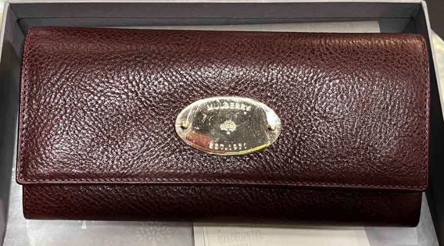 A boxed Mulberry continental ladies wallet/purse in oxblood