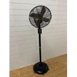 A vintage Cinni metal floor standing fan