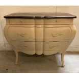 A white painted Louis XV style Bombe commode with three drawers and down swept legs Height 89