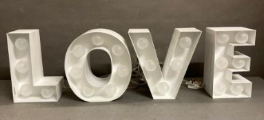 A set of 25cm high "light up love" letters