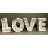 A set of 25cm high "light up love" letters