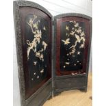 A late 19th century Japanese black laquered screen with mother of pearl and bone bird details.