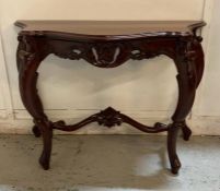 A Louis Philippe style carved mahogany console table (H77cm W107cm D45cm)