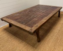 A North African reclaimed panel converted into a large low table or day bed height 38cm and 205X114