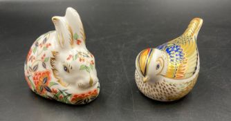 Two boxed Royal Crown Derby paperweights, Firecrest and Meadow Rabbit, one with gold stopper and one