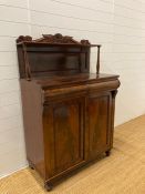 A mahogany two door side cabinet with galleried top (H150cm W93cm D50cm)