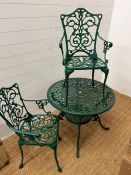 A metal garden bistro set with two chairs and green circular table (Dia 86cm)