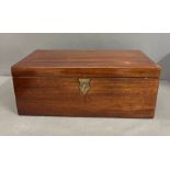 A George III style writing box with brass handles opening to writing slope and compartments