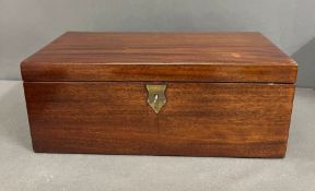 A George III style writing box with brass handles opening to writing slope and compartments