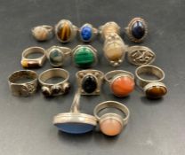 A selection of silver fashion rings, various stones and settings