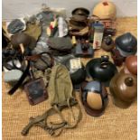 A selection of military uniform and accessories, some items reproduction