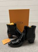 Tod's black boots, boxed