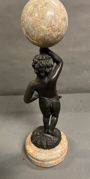 A bronze and marble statue of a boy holding a marble ball above his head - Image 6 of 7