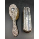 Two hallmarked silver backed dressing table brushes.