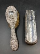 Two hallmarked silver backed dressing table brushes.