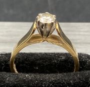 An 18ct gold ring with a .3ct diamond Size L1/2 (Marked 750 Approximate Total Weight 3.5g)