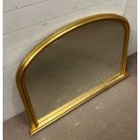 A gilt frame over mantle mirror 81cm x 114cm