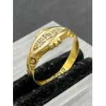 An 18ct gold ring (Approximate Total Weight 1.9g) Size L