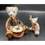 Two boxed Royal Crown Derby paperweights, Teddy Bear and Drummer Teddy, one with gold stopper.