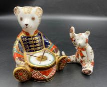 Two boxed Royal Crown Derby paperweights, Teddy Bear and Drummer Teddy, one with gold stopper.