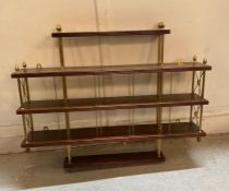 A mahogany and brass wall hanging shelving unit (70cm x 84cm)
