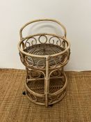A Bentwood wicker two tier trolly (H67cm Dia42cm)