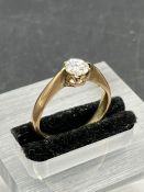 A Diamond solitaire Approx. .5ct set in 18ct gold Size N