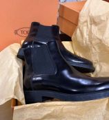 A pair of black ankle boots by Tod's