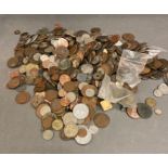 A large selection of world coins including Great Britain, various denominations, ages and