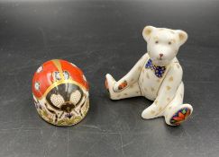 Two boxed Royal Crown Derby paperweights, Ladybird and Teddy Bear, one with silver stopper