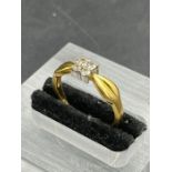 A four stone diamond ring, hallmarked 916 for 22ct gold (Approximate Total Weight 3.3g) Size M