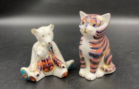 Two boxed Royal Crown Derby paperweights, Mum and Charlotte and a cat, one with gold stopper
