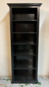A black painted six shelf book case (H263cm W80cm D34cm)