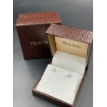 A pair of diamond stud earrings 0.7g