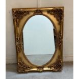 A wooden gold painted hall mirror 81cm x 112cm