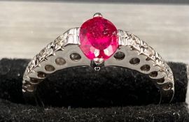 A Genuine high spec.high tech.'AAA' fine grade lab grown ruby and natural diamond ring. Comprising