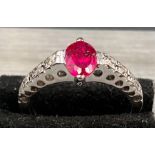 A Genuine high spec.high tech.'AAA' fine grade lab grown ruby and natural diamond ring. Comprising