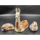 Three Royal Crown Derby paperweights, Kitten, camel and duckling, all three with gold stoppers,
