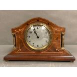 A mahogany inlaid eight day mantel clock