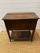 A mahogany drinks table/cupboard with Mechanical raising top with glass decanters and compartments