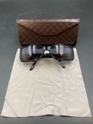 A pair of boxed ladies Gucci sunglasses
