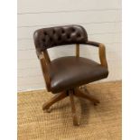 A contemporary captains desk chair