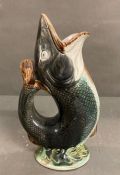 A vintage hand painted fish glug jug