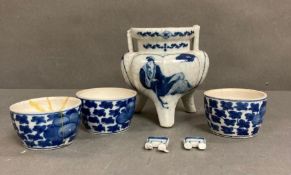 A blue and white Chinese incense burner and three cups AF