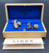 A pair of Links Silver gents cuff links, golf themed.