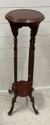 A mahogany torchiere or plant stand with barley twist supports (H100cm)